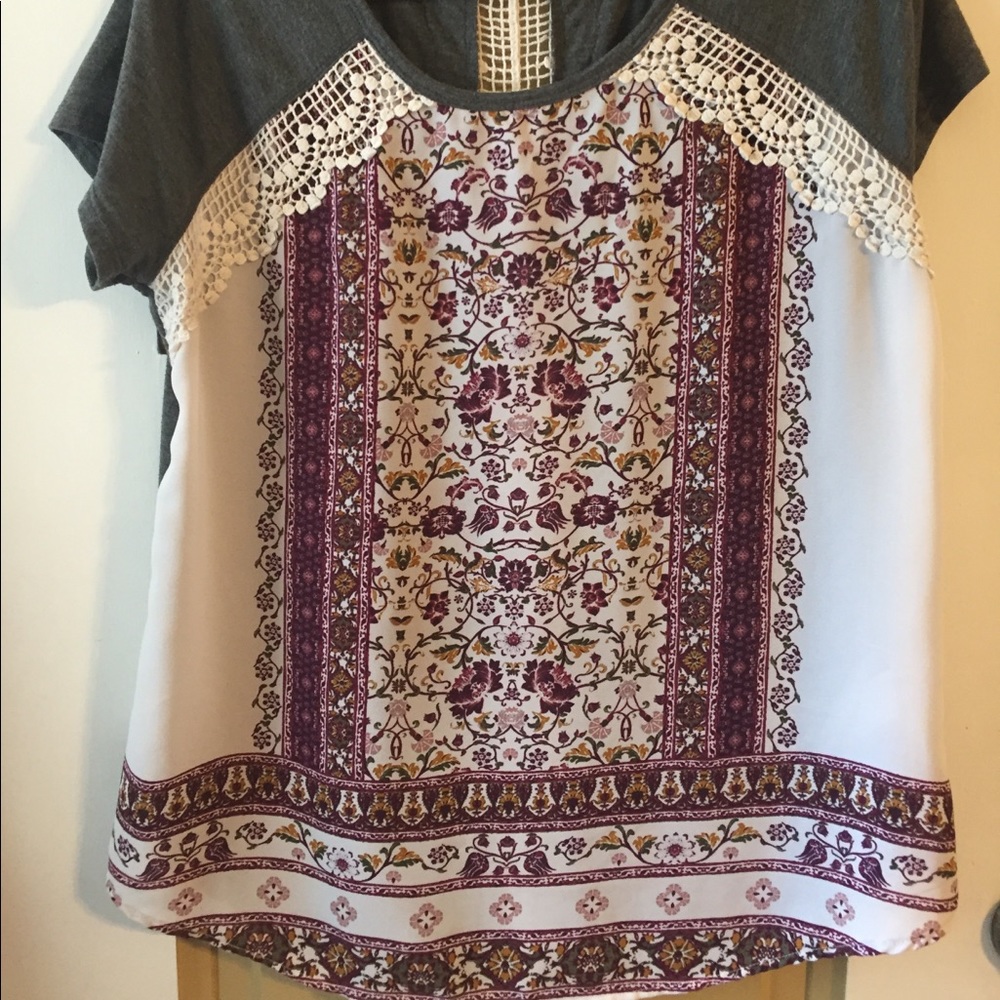 Super cute top with crocheted detail!